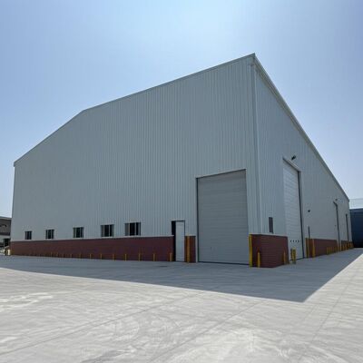 Brick Wall 12m Height Steel Structure Warehouse Design Tailored for Customers Requirements Spacious and Storage Facility